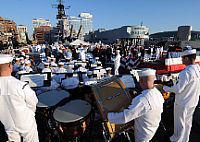 The U.S. Fleet Forces Band plays during the 237th Navy birthday celebration aboard the Battleship Wisconsin.