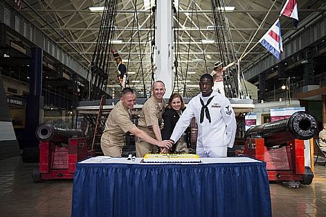 Chief of Naval Operations (CNO) Adm. Jonathan Greenert, Master Chief Petty Officer of the Navy (MCPON) Mike Stevens and two junior Sailors cut a birthday cake in front of USS Constitution's fighting top at the National Museum of the U.S. Navy. Greenert and Stevens hosted a worldwide Navy birthday all-hands call and reenlistment. The event was broadcast live on television via satellite to Sailors overseas and at sea, and carried around the world on the internet. The U.S. Navy is constantly deployed to preserve peace, protect commerce, and deter aggression through forward presence. Join the conversation on social media using #warfighting.  U.S. Navy photo by Mass Communication Specialist 1st Class Peter D. Lawlor (Released)  121011-N-WL435-257