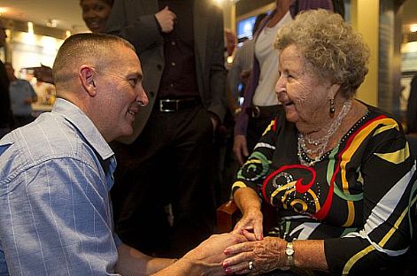 Prospective Master Chief Petty Officer of the Navy (MCPON) Mike D. Stevens talks with Mrs. Ima Black, wife of the first MCPON, Delbert Black, during a Navy enlisted leaders' social at the United States Navy Memorial. The social was part of the 2012 MCPON Leadership Mess Symposium, a gathering of command, force, and fleet master chiefs from throughout the fleet.  U.S. Navy photo by Mass Communication Specialist 2nd Class Thomas L. Rosprim (Released)  120926-N-IV546-159