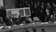 In this October 25, 1962 file photo, U.S. Ambassador Adlai Stevenson, far right, describes aerial photographs of launching sites for intermediate range missiles in Cuba during an emergency session of the United Nations Security Council at U.N. Headquarter