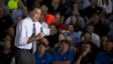 Republican presidential candidate, former Massachusetts Gov. Mitt Romney gestures during a town hall meeting at Ariel Corporation in Mt. Vernon, Ohio, October 10, 2012.