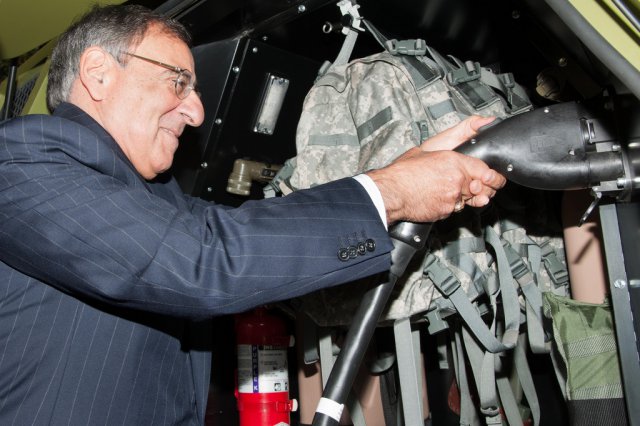 Secretary of Defense Leon Panetta examines the U.S. Army Research, Development and Engineering Command's Fuel Efficient Ground Vehicle Demonstrator Bravo at the Pentagon, Oct. 4, 2012.