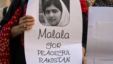 An activist from non-governmental organization Insani Haqooq Ittihad holds a picture of Malala Yousufzai during a demonstration in Islamabad October 10, 2012. 