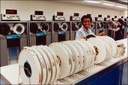 Two women work with computer data storage tapes from the National Crime Information Center, or NCIC, in the early 1970s at the Criminal Justice Information Services Division. Since 1967, NCIC has served as an electronic clearinghouse of crime data that can be tapped into around the clock by criminal justice agencies nationwide.