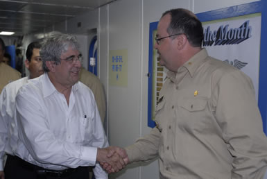 CAPT Dean Coppola, the Officer-in-Charge who is also a dentist, exchanges greetings with the vice president of the Republic of Guatemala as the USPHS Commissioned Corps arrives as part of Operation Continuing Promise.