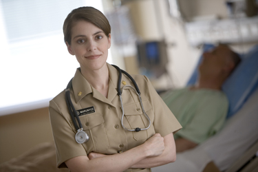 United States Public Health Service Commissioned Corps nurse with a patient