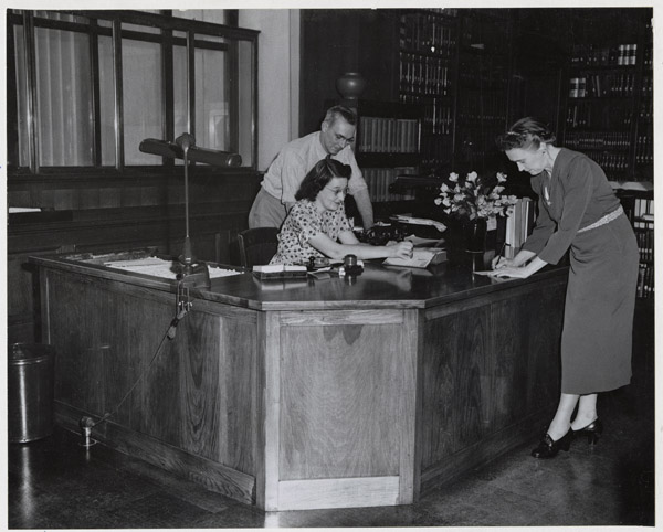image of woman giving customer service