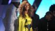 Beyonce accepts the award for best female R& B at the BET Awards on July 1, 2012, in Los Angeles. 