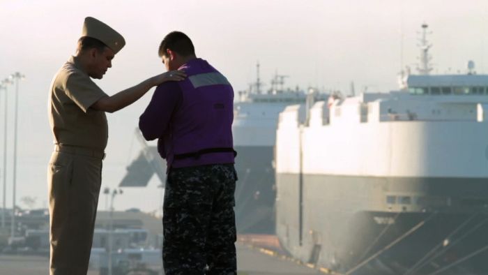 Captain Emilio Marrero and Lieutenant Commander Frank Munoz, Navy Chaplain Corps.