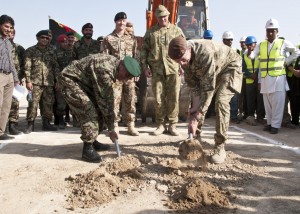 Gen Karimi and Lt Gen Bradshaw break ground during the ANA Officer Academy ground breaking ceremony.