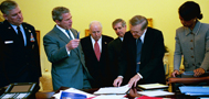 During his morning briefing, April 2, 2003, President George W. Bush reviews the progress of the war with members of the War Council. (P28531-23A)