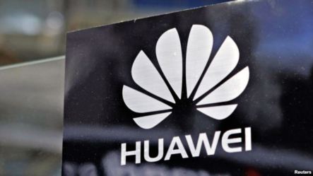 A Huawei logo is seen above the company's exhibition pavilion during the CommunicAsia information and communications technology trade show in Singapore on June 19, 2012.