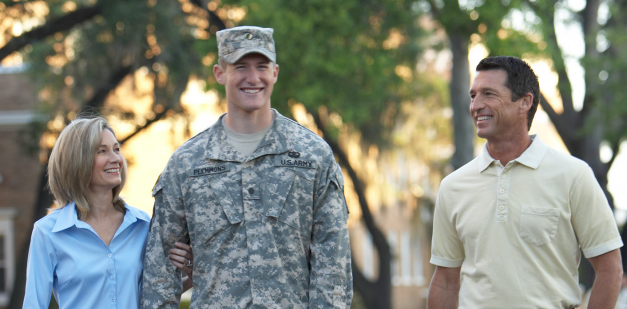 Photo of a Soldier walking with his family