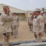 Romanian Gendarmerie Lt. Col. Florian Panainte, left, salutes Lt. Col. Viorel Matei, right, during a transfer of authority ceremony at the Kandahar Regional Training Center in southern Afghanistan, May 16, 2012.