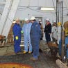 Secretary Salazar speaks with oil rig workers