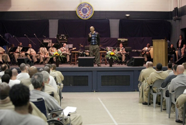 Coach Tony Dungy speaking with inmates at the Uncommon Leaderships event at the Plainfield Correctional Facility, Indiana.