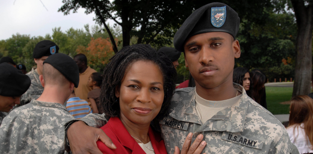 U.S. Army Soldier hugging his mother at graduation