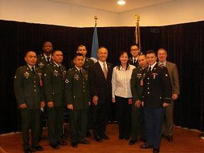 CBP Commissioner Alan Bersin (center) with nine new citizens who were naturalized by USCIS Seoul Field Officer Director Kenneth Sherman (right) on Feb. 15, 2011, at the U.S. Embassy in Seoul, South Korea.