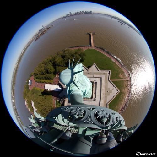 Image description: Today is the Statue of Liberty&#8217;s 125th birthday. It was dedicated on October 28, 1886 and was a gift of friendship from the people of France to the people of the United States.
To celebrate 125 years, five live webcams from the Statue&#8217;s torch will be turned on and give the world access to an area of the Statue that has been closed since 1916. This photo was taken while the crew installed the new webcams.
Photo from the Statue of Liberty National Monument on Facebook