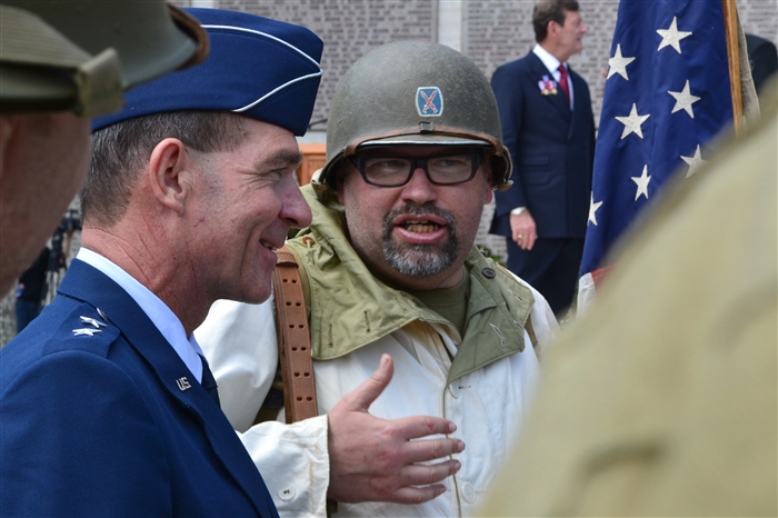 EUCOM Chief of Staff Maj Gen Mark Barrett meets with World War II re-enactors after the Memorial Day ceremony at the Florence American Cemetery May 28, 2012.