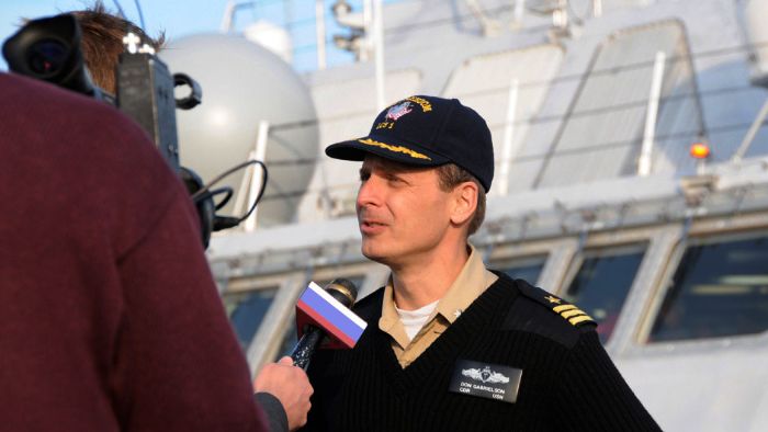 An operational Commander addresses the media after being briefed and advised by his Public Affairs Officer.  