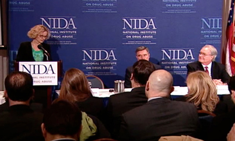 Image of NIDA Director Nora D. Volkow, M.D. discussing the 2010 Monitoring the Future survey results at press conference.
