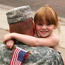 ARMY father hugging daughter