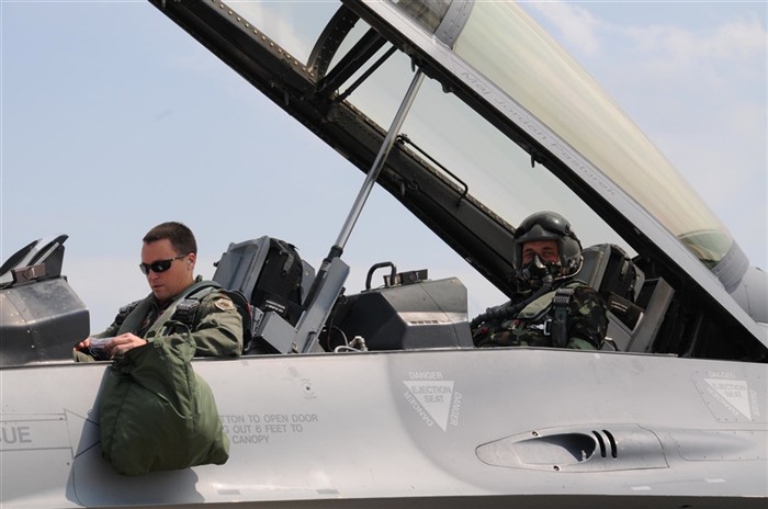 Capt. Steve Strandburg, from the Alabama Air National Guard prepares to fly Lt. Gen. Serhiy Onyschenko in an Air National Guard F-16D for an orientation flight at Mirgorod Air Base, Ukraine during SAFE SKIES 2011 on July 22, 2011. (U.S. Air Force photo by Maj. Matthew T. Mutti , 104FW/CCE)