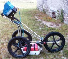 (photo) A ground penetrating radar system on wheels. (Midwest Archeological Center)