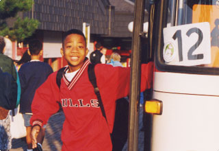 Student getting off bus