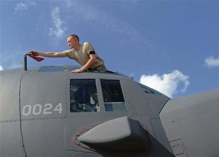 Senior Airman David Pickren, an MC-130H Combat Talon II crew chief with the 352nd Special Operations Maintenance Squadron, RAF Mildenhall, U.K., conducts preflight checks during Jackal Stone 11 exercise on Mihail Kogălniceanu Airbase, Romania, Sept. 19, 2011.  The purpose of the exercise, coordinated by Special Operations Command Europe, is to enhance special operations forces capacity and interoperability between the nine participating nations, while simultaneously building cooperation and partnerships.