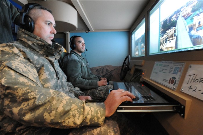 Soldiers learn to visually identify indicators of an IED and react to the threat in the Multicultural Mobile Counter Improvised Explosive Device (MCMCIT). The newest Mobile Counter-IED trainer provided by the Training Support Activity Europe. The McMCIT is being used at GrafenwoehrrrÃ¢Âs Motor park 7 to prepare Soldiers for deployment. Photo by Gertrud Zach, Training Support Activity Europe
 

