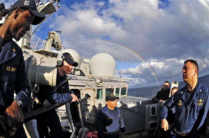 MEDITERRANEAN SEA (Feb. 3, 2011) Cmdr. A.H. Ibarra, commanding officer of USS Barry (DDG 52), discusses tactics and proper procedures with Barry's Sailors during a joint exercise with the French navy. Barry deployed as part of Enterprise Carrier Strike Group in support of maritime security operations and theater security cooperation efforts in the 6th Fleet areas of responsibility. (U.S. Navy photo by Mass Communication Specialist 3rd Class Jonathan Sunderman/Released)