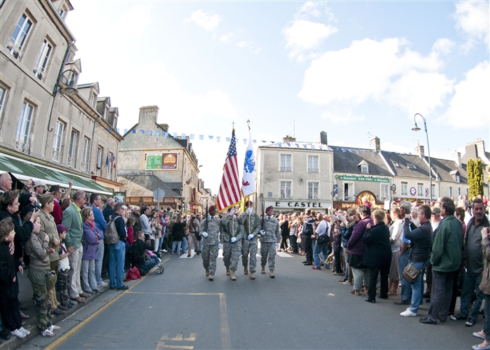 Task Force 68, which is made up of paratroopers from U.S., Germany, France, Holland, and United Kingdom, re-enacted the D-Day airborne operation on the La Fiere fields near Ste. Mere Eglise, France to commemorate the heroic acts of the WWII paratroopers who made the jump 68 years ago. After the jump, the task force marched into the town of Ste. Mere Eglise tothe sounds of cheers from the locals. Task Force 68 is in Normandy, France to commemorate the 68th annivesary of D-Day. 