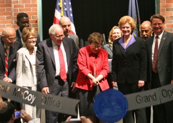 Acting Secretary Rebecca Blank cuts the steel ribbon, officially opening the Elijah J. McCoy USPTO Satellite Office