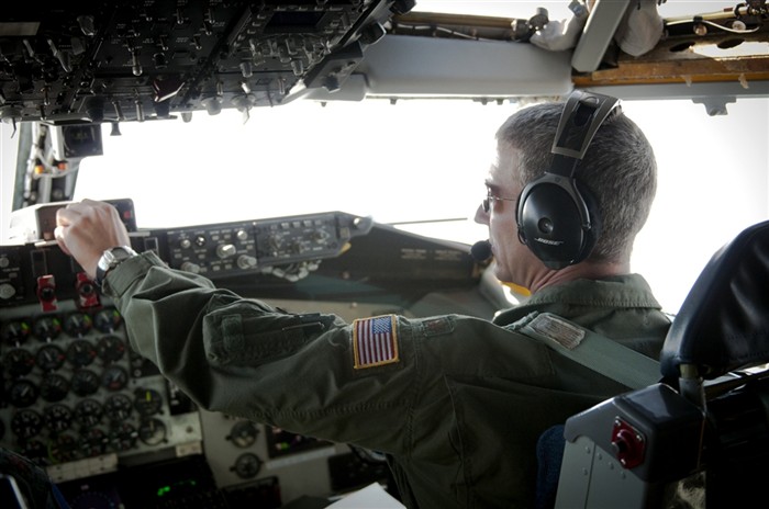 KEFLAVIK, Iceland -- Maj. Derck Mullin, 756th Air Refueling Squadron, adjusts the controls on an altitude warning system before preparing to refuel NATO aircraft during the 2011 Northern Viking exercise here June 9. Northern Viking tests the capabilities of Iceland and the country's NATO allies, as well as "increase the readiness of the forces involved and their interoperability." The Reserve 459th Air Refueling Wing, Joint Base Andrews, Md., participated in this year's exercise along with other active-duty and Air National Guard units. (U.S. Air Force photo released/Tech. Sgt. Steve Lewis)