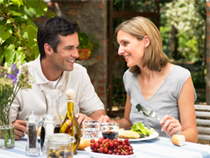 Man and woman eating at a restaurant