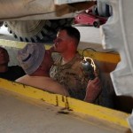 Pfc. Vlado Tudan (left), Pfc. Dubravko Preglej (center) and Sgt. Carmon Cave Jr. inspect the undercarriage of a Load Handling Service vehicle to be serviced in the Croatian vehicle maintenance workshop at Camp Marmal, April 2. Armed Forces of the Republic of Croatia have been a part of the International Security Assistance Force since 2003. ISAF Regional Command North supports Afghan National Security Forces in close coordination and collaboration in providing security and disrupting insurgent activities in order to protect the Afghan population.