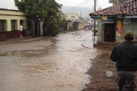 The capital of Honduras, Tegucigalpa, was flooded by Hurricane Mitch in October 1998.