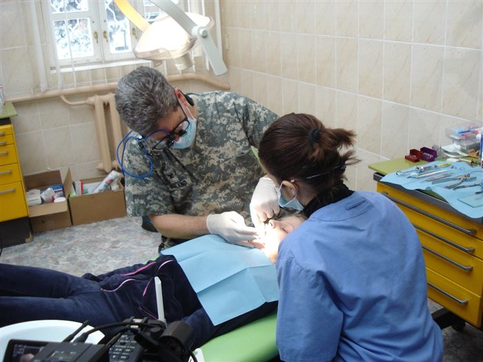 A team of dentists from the North Carolina National Guard and a team of dentists from the University of North Carolina traveled to Moldova to provide free dental care to Moldovan children. 