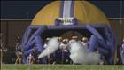 Bleckley County running onto the field before the start of their game against Macon County.