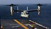 An MV-22 Osprey aircraft lands on the flight deck of the multipurpose amphibious assault ship USS Bataan (LHD 5) in the Atlantic Ocean.