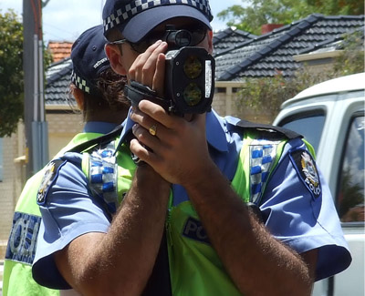 Officer with radar gun