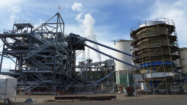 New screening equipment used to refine wood chips at the North Pacific Paper Corporation paper mill in Longview, Wash., is expected to save NORPAC 100 million kilowatt hours of electricity a year, which is enough energy to serve 8,000 Northwest homes. Construction of the chip pretreatment structure, shown here, is scheduled to be completed in 2013. | Photo courtesy of Bonneville Power Administration.