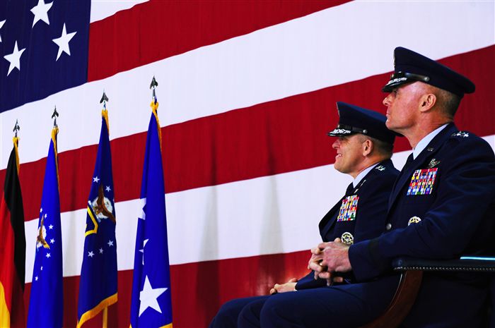 Lt. Gen. Frank Gorenc, outgoing 3rd Air Force commander, and Lt. Gen. Craig Franklin, incoming 3rd Air Force commander, listen to Gen. Mark A. Welsh III, United States Air Forces in Europe commander, during a change of command ceremony on Ramstein Air Base, Germany, March 30, 2012. Gorenc passed command to Franklin. 