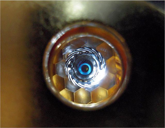 A view of a cryogenically cooled National Ignition Facility (NIF) target as "seen" by the laser through the hohlraum's laser entrance hole. | Photo courtesy of Lawrence Livermore National Laboratory.