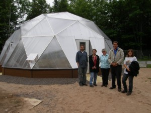 U.S. Forest Service Botanist Jan Schultz visits greenhouse.