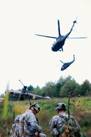 Two UH-60 Black Hawk helicopters take off after picking up a simulated casualty at the site of a downed aircraft, Sept. 26, 2012, in the Fort Drum, N.Y., training area. Soldiers of Pathfinder Company, 2-10 Aviation Regiment, Task Force Knighthawk, 10th Combat Aviation Brigade, have been conducting personnel recovery training over the past three months. Personnel recovery is one of the company's most important roles in combat.