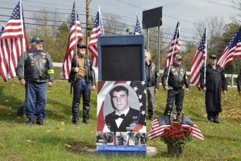 Patriot Guard Riders line the perimeter just prior to the start of the bridge dedication ceremony on Oct. 14, 2012.