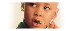 Graphic of child with a thermometer in his mouth.